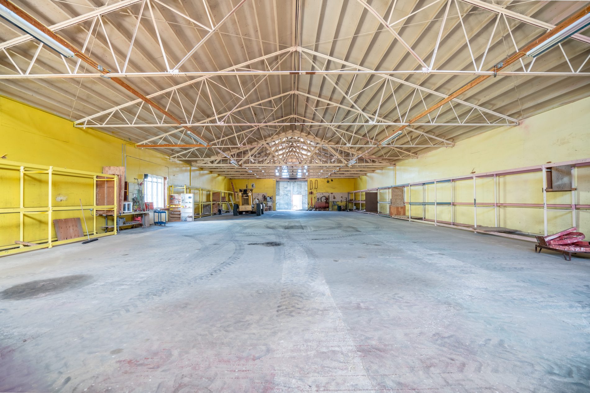 Interior of the concrete-block storage building with 25-foot cathedral ceilings