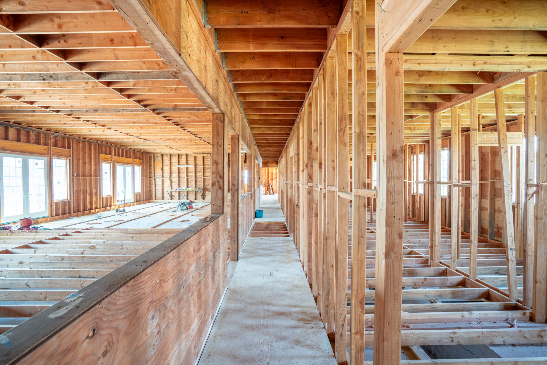 Framed interior of the multi-use barn ready for residential conversion