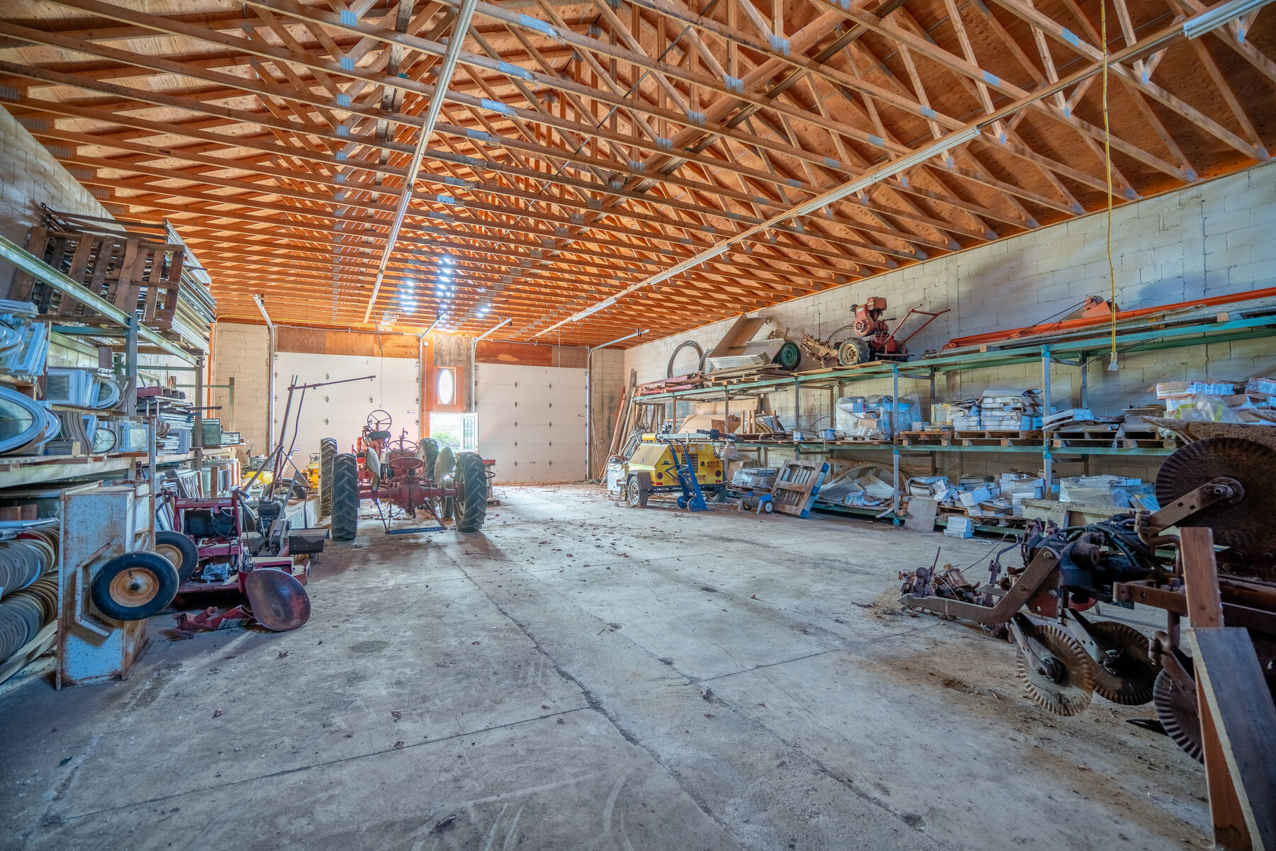Building 3 interior with vaulted wood ceiling and storage